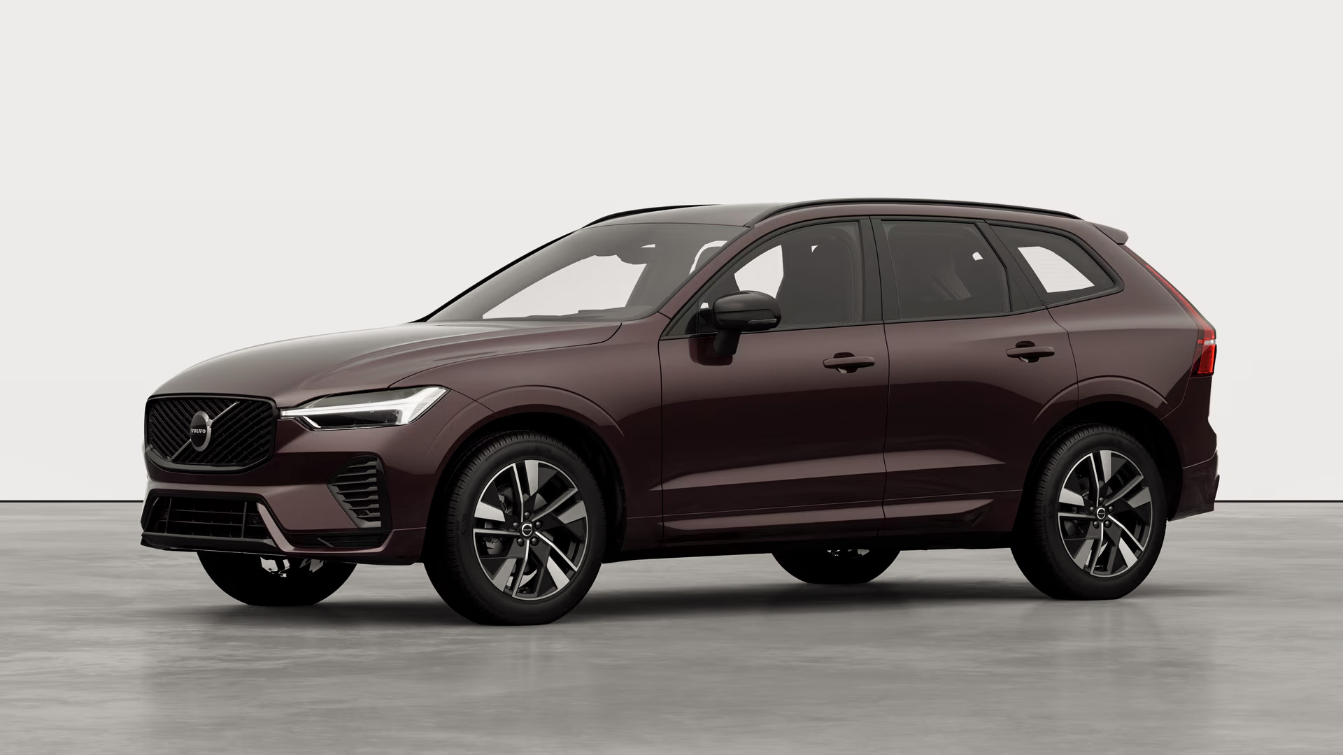 2026_XC60-B5-Plus_Mulberry-Red-739_exterior-studio-threeQuartersFrontLeft